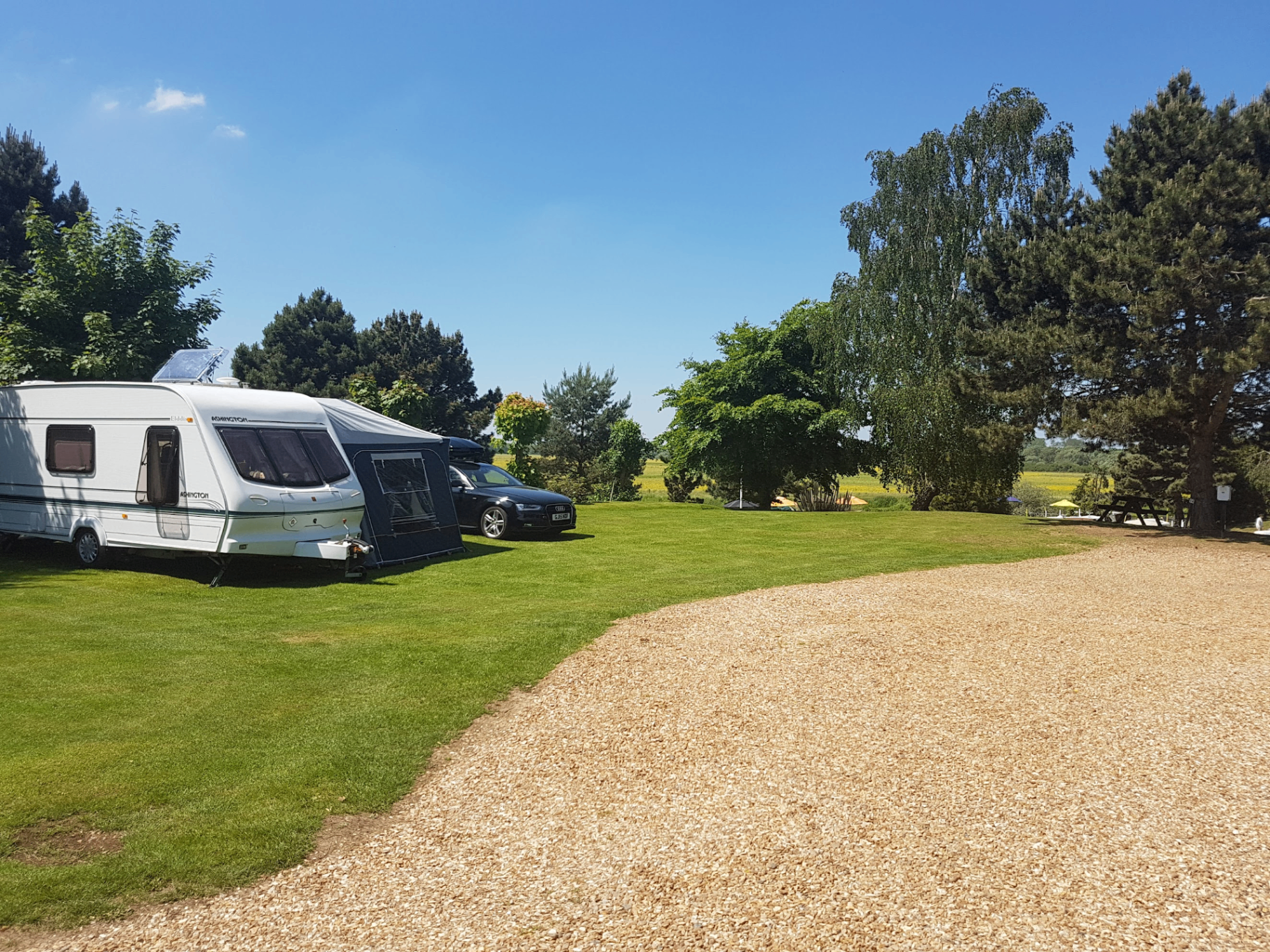 Spacious caravan pitch with river views