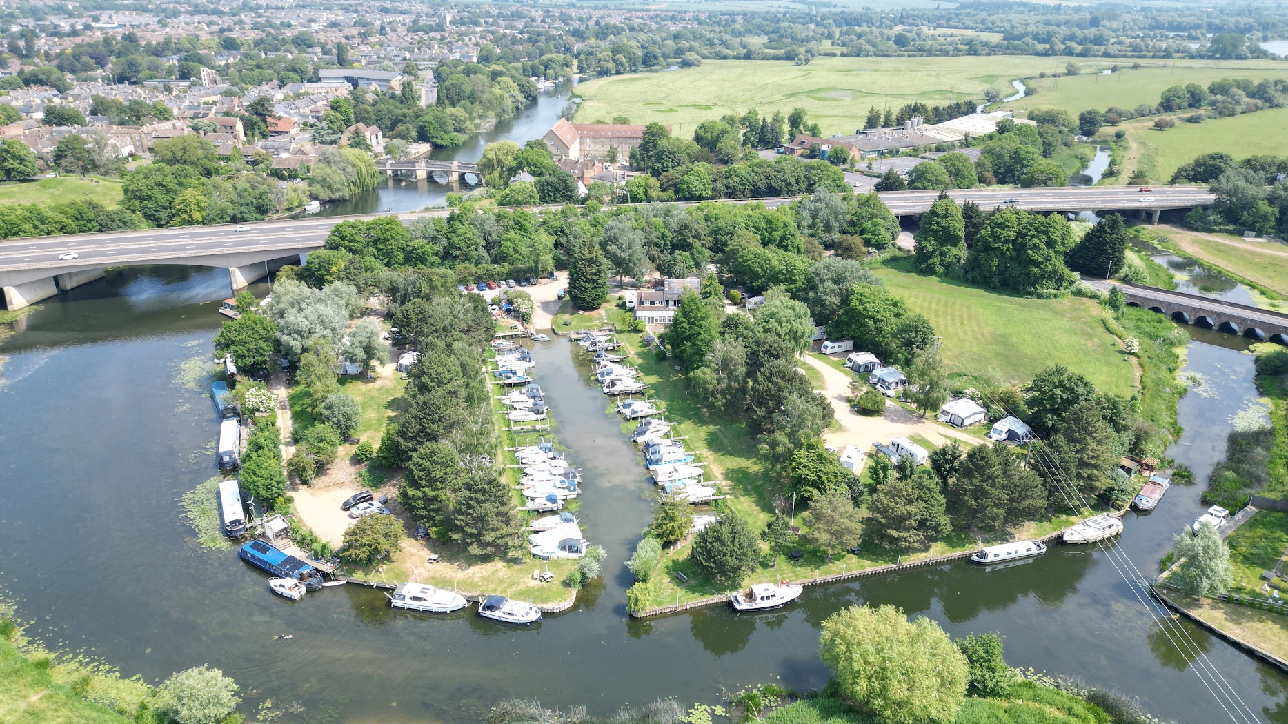 Aerial view of Huntingdon Boathaven marina basin and camping grounds