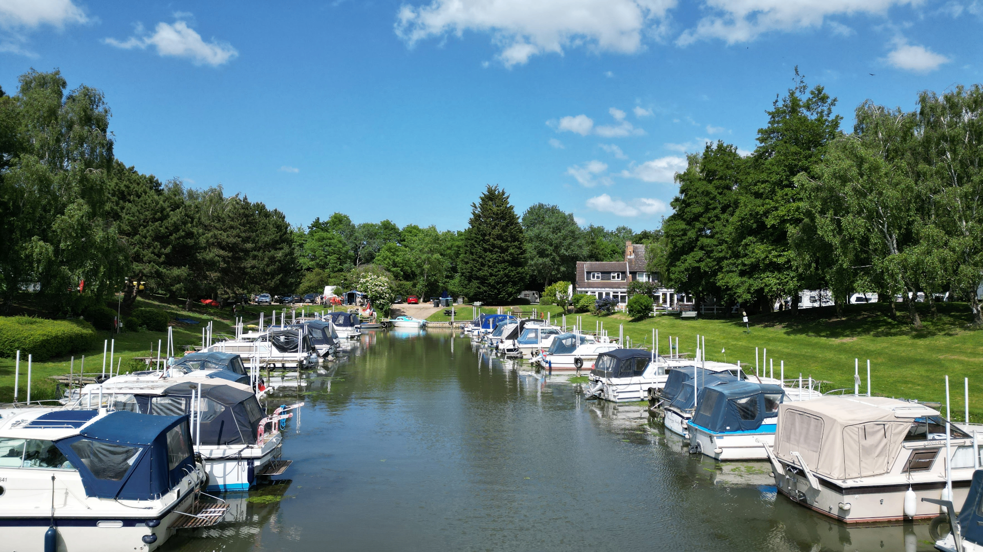Boats moored in the tranquil marina basin