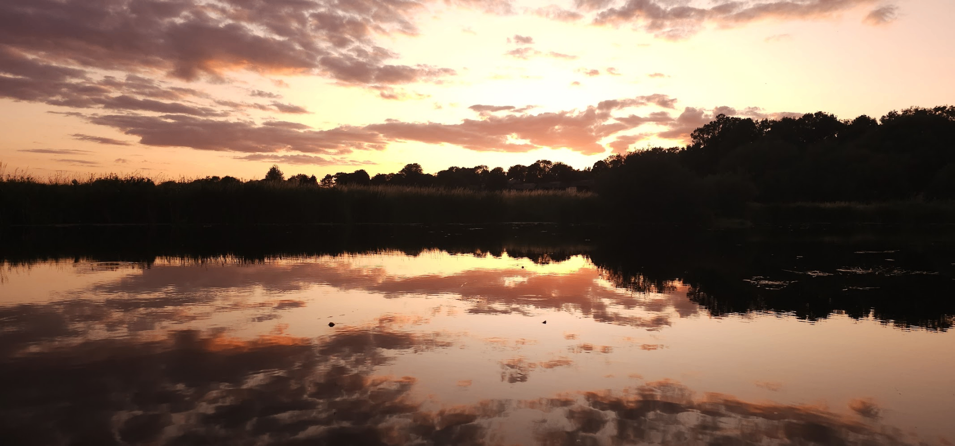 Huntingdon Boathaven at sunset — riverside camping and moorings on the River Great Ouse